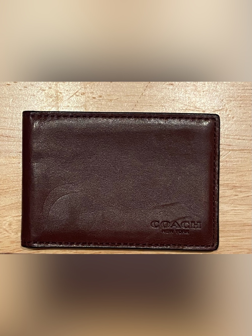 Coach Leather ID wallet in Dark Brown.